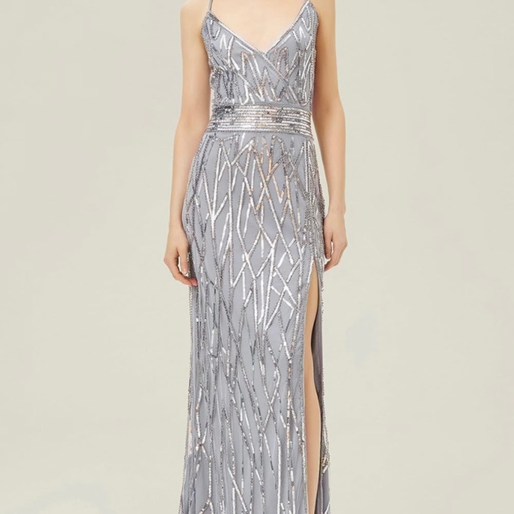 New with tags, beautiful sequin details, slit, open back